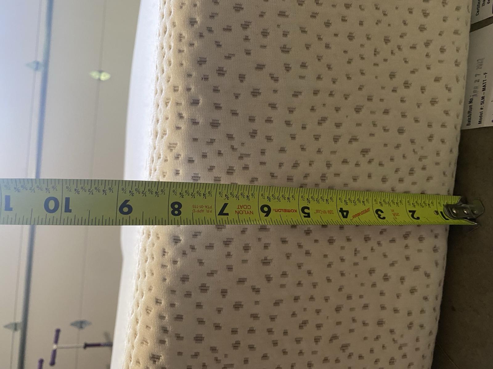 Measuring 5 Little Monkeys mattress thickness